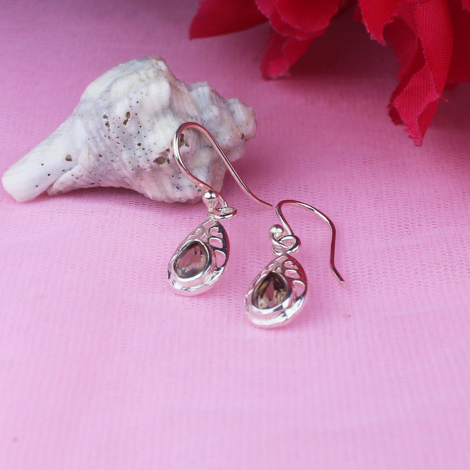Opulent
Brown Smoky Quartz Earrings Made of Brass Silver Polished Danglers